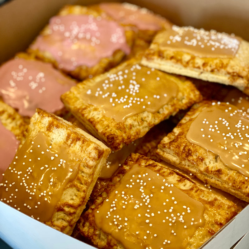 Box of pop tarts with different fillings and toppings